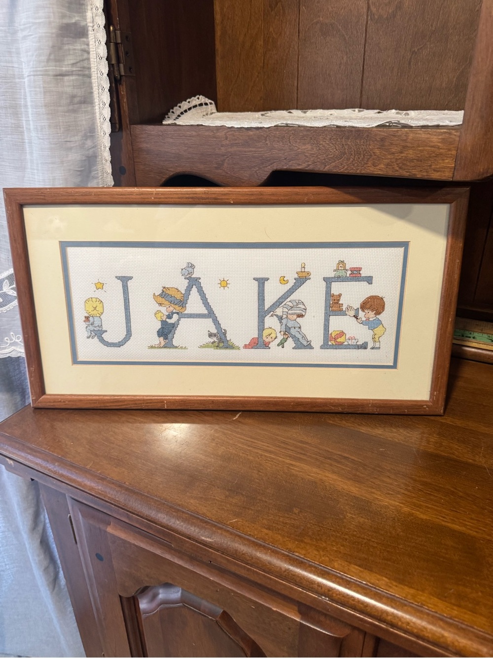 Framed 'JAKE' Cross Stitch Artwork in Blue and Brown
